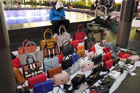 is it illegal to buy fake bags|selling branded purses legal.